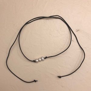 three pearl necklace with tie closure